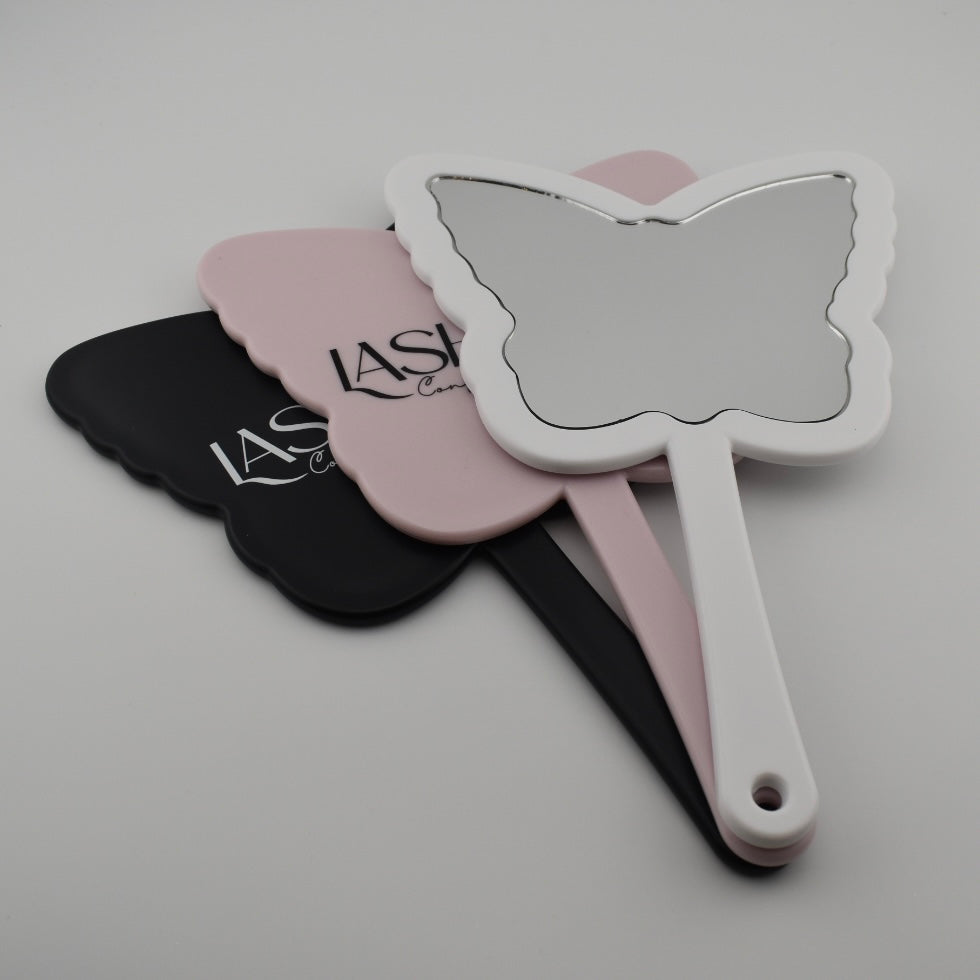 THE REVEAL *Handheld Mirror